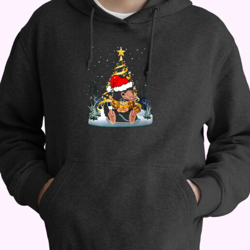 Christmas Tree Under Snow Niffler Santa Hat Essential Hoodie