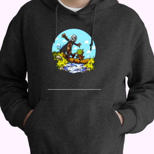 Stormtrooper And Baby Yoda Walking On The River Essential Hoodie